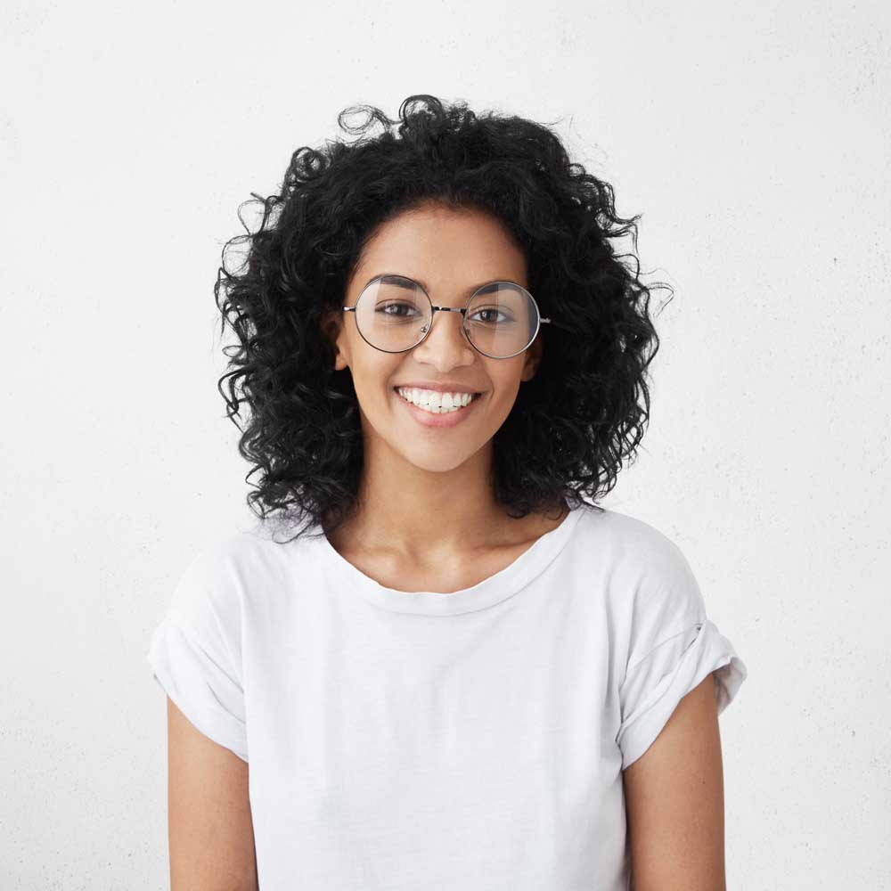 smiling girl wearing glasses